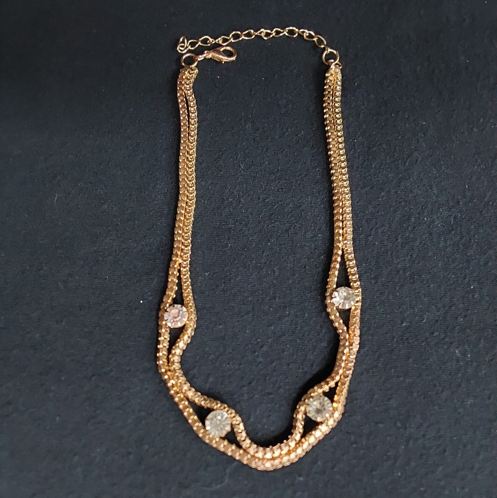Rose "gold" and Rhinestone Necklace 14" long Rose gold color with 4 rhinestones